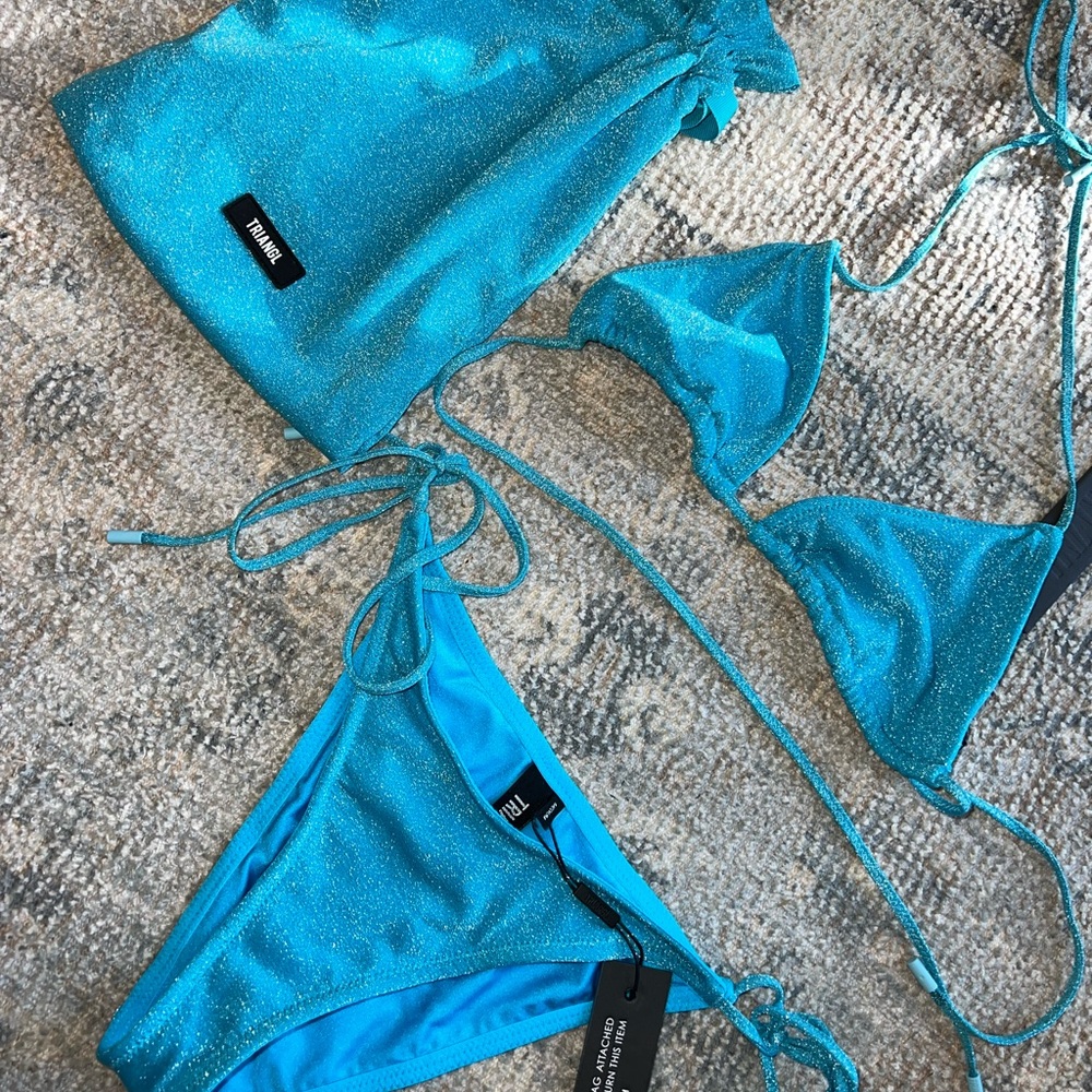 Brand new Triangl swim set tags still on.